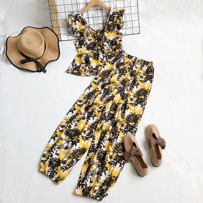 Naiste komplektne pluus V-kaelusega ja kõrge vöökohaga püksid