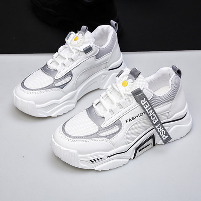 Uus tikandi ja pealdisega naiste tossude mudel