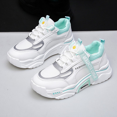 Uus tikandi ja pealdisega naiste tossude mudel