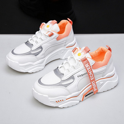 Uus tikandi ja pealdisega naiste tossude mudel