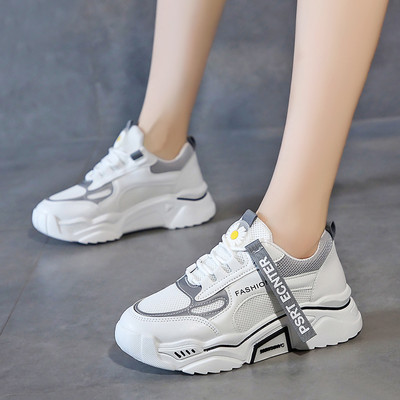 Uus tikandi ja pealdisega naiste tossude mudel