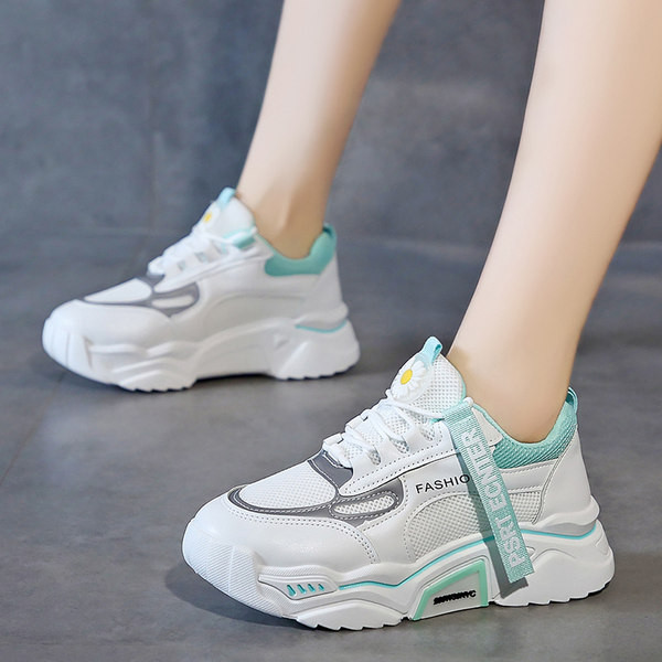 Uus tikandi ja pealdisega naiste tossude mudel