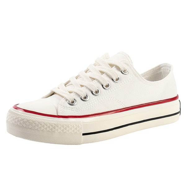 Tekstiilist valmistatud vabaaja tossud paelte ja lameda tallaga naistele