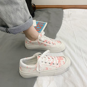 Naiste lõuendist värvitrükiga tossud