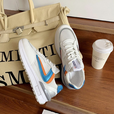 Légáteresztő női sportcipő fűzővel és lapos talppal