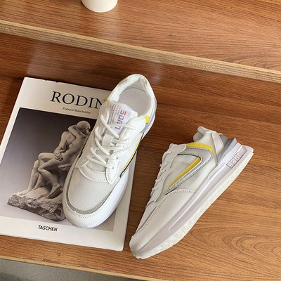 Légáteresztő női sportcipő fűzővel és lapos talppal