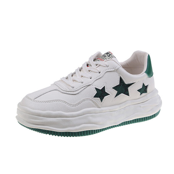 Naiste ökonahast tossud embleemi ja lipsudega