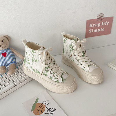 Naiste lõuendist tossud värvilise prindi ja lameda tallaga