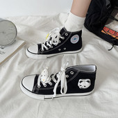 Naiste lõuendist kõrged tossud lameda talla ja 3D elemendiga