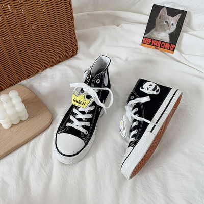 Naiste lõuendist kõrged tossud lameda talla ja 3D elemendiga