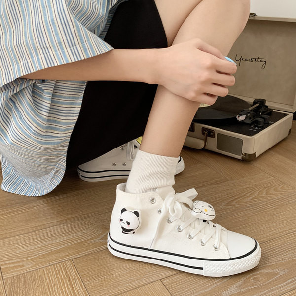 Naiste lõuendist kõrged tossud lameda talla ja 3D elemendiga