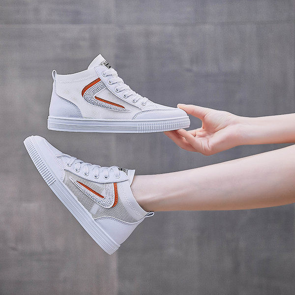 Naiste kõrged tossud dekoratiivkivide ja lipsudega