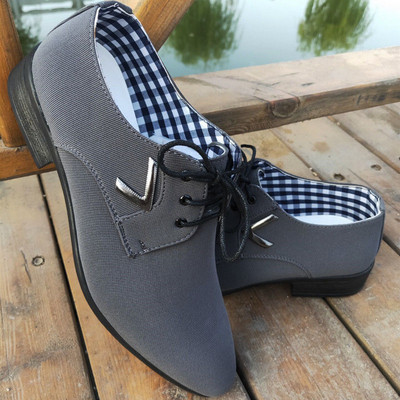 Paelte ja metallelemendiga meeste tekstiilist kingad