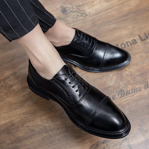 Moodsad mustad ja pruunid pidulikud meeste kingad