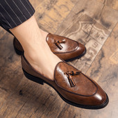 Elegantsed tutidega nahast kingad meestele