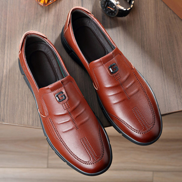 Meeste metallkaunistustega nahast kingad