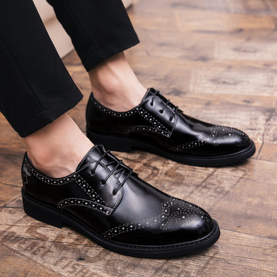 Meeste nahkkingad terava otsaga paeltega mudel