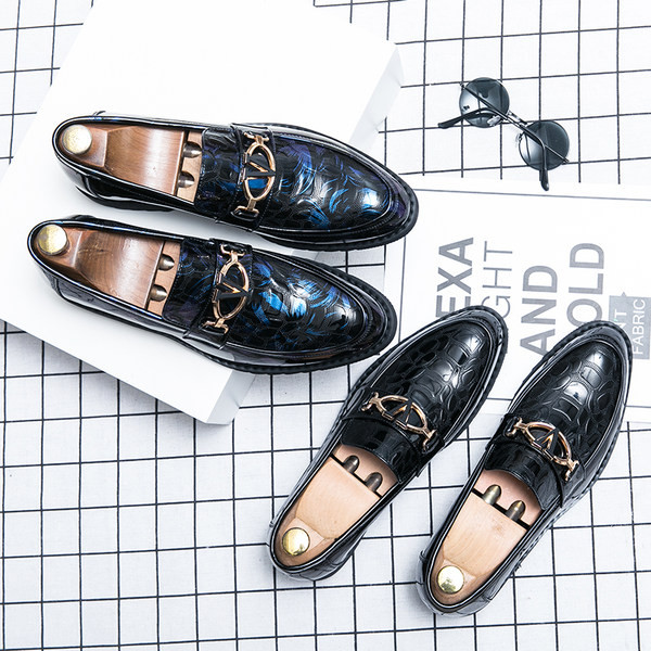 Metallist kaunistusega meeste kingade teritatud mudel