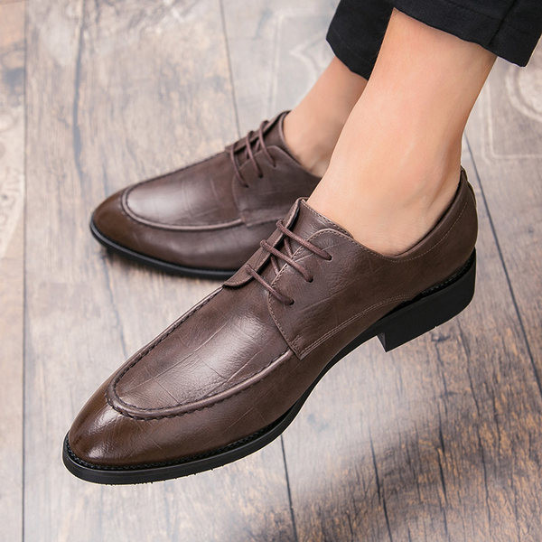 Elegantne paeltega kingade mudel - meestele