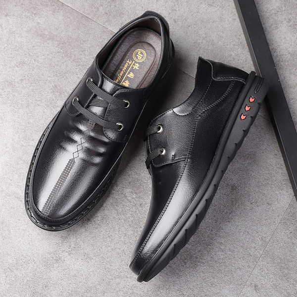 Meeste nahast kingad paelte ja kirjaga