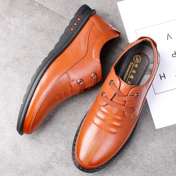 Meeste nahast kingad paelte ja kirjaga