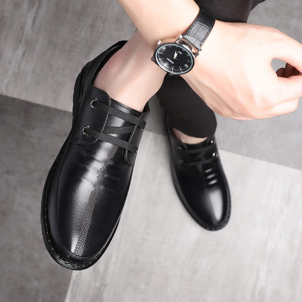 Meeste nahast kingad paelte ja kirjaga