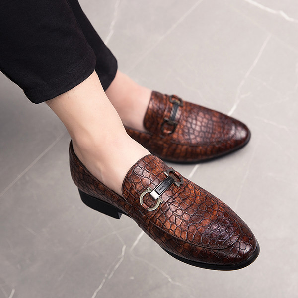 Elegantsed pandlaga reljeefsest nahast valmistatud meeste kingad