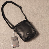 Öko-nahast lukuga ja metallist kinnitusega vabaaja meeste kott