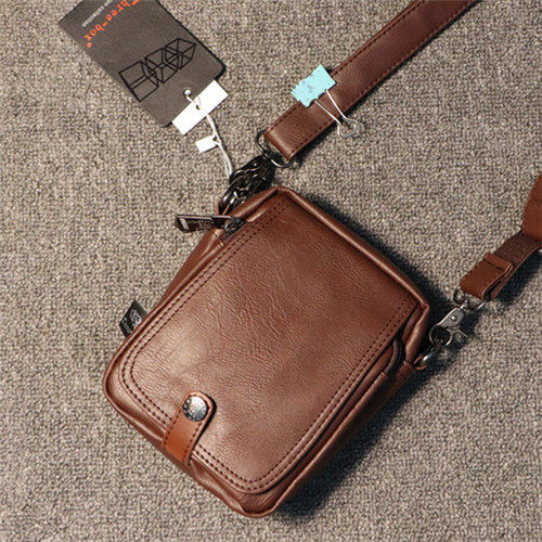 Öko-nahast lukuga ja metallist kinnitusega vabaaja meeste kott