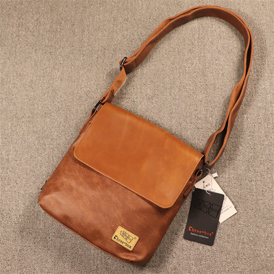 Modern férfi műbőr táska fém rögzítéssel