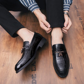 Metallist kaunistusega pidulikud meeste kingad