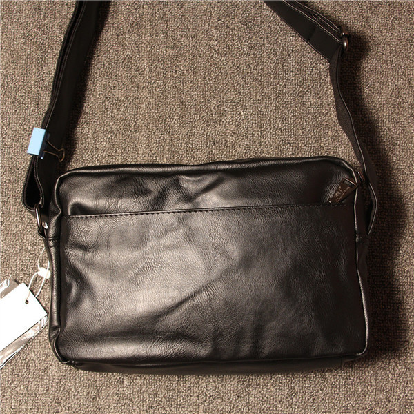 Meeste nahast kott värvilise paela ja pika sangaga