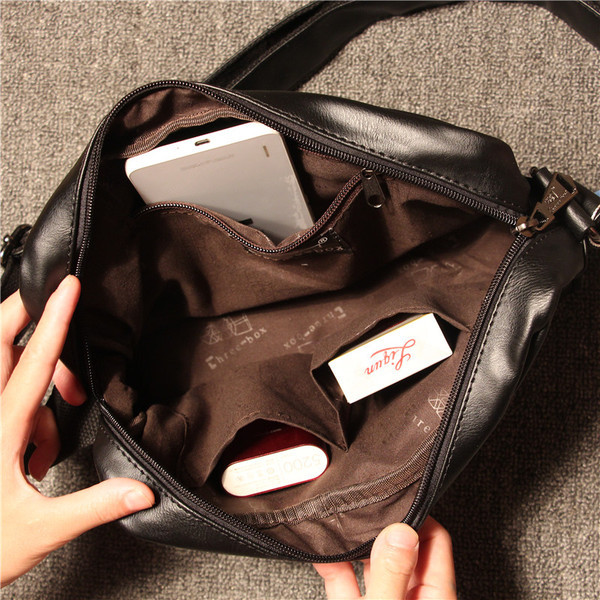 Meeste nahast kott värvilise paela ja pika sangaga