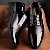 Stiilsed paelte ja kirjaga meeste kingad