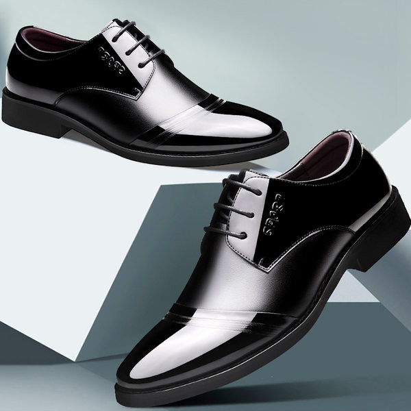 Stiilsed paelte ja kirjaga meeste kingad