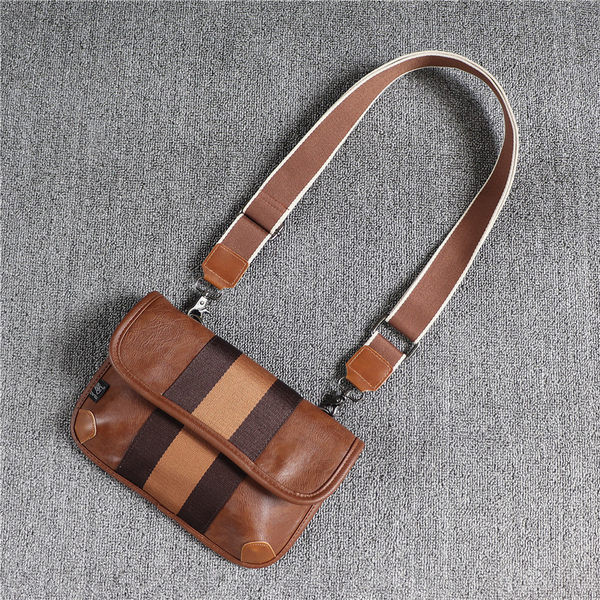 Pika sanga ja metallist kinnitusega nahast meeste sportkott