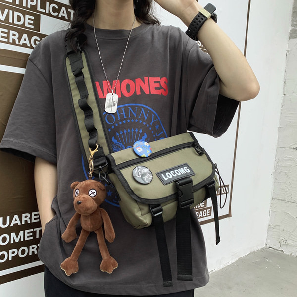 Meeste tekstiilist plastiklukuga õlakott