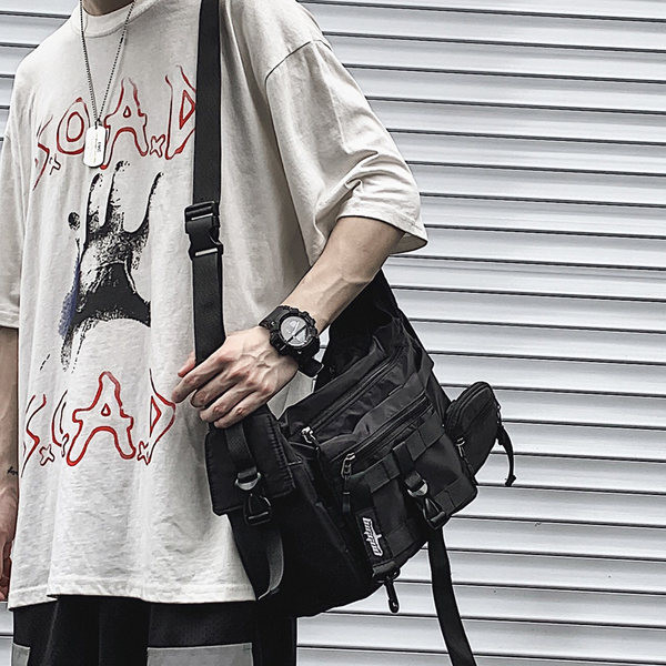 Nagyméretű textil táska sok zsebbel