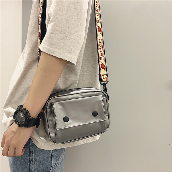 Nööpide ja värvi reguleeritava käepidemega meestekott