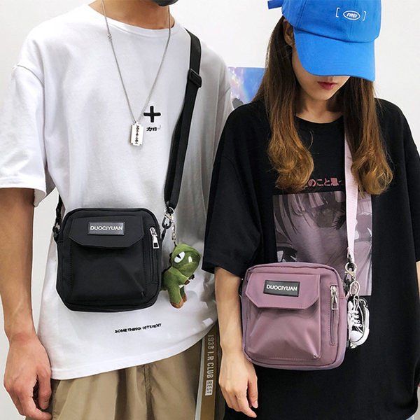 Vīriešu soma ar priekšējo kabatu un garu rokturi