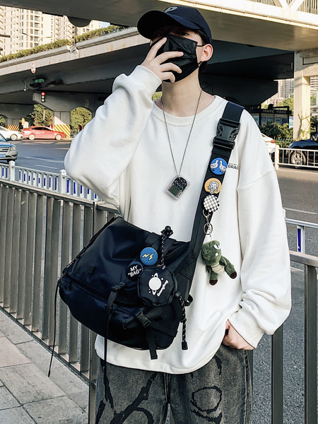 Liela tekstila soma ar plastmasas aizdari - vīriešiem