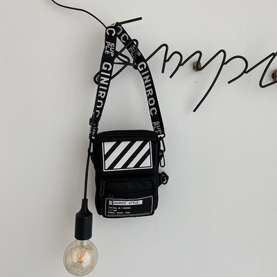 Väike tekstiilist kott pika sangaga