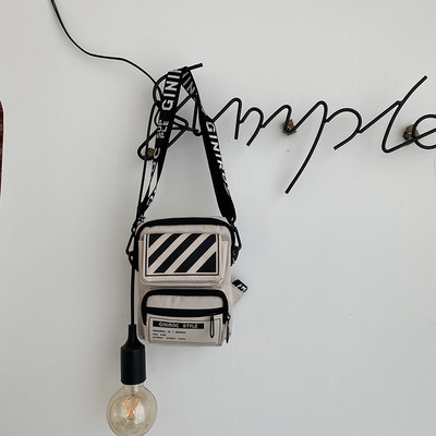 Väike tekstiilist kott pika sangaga