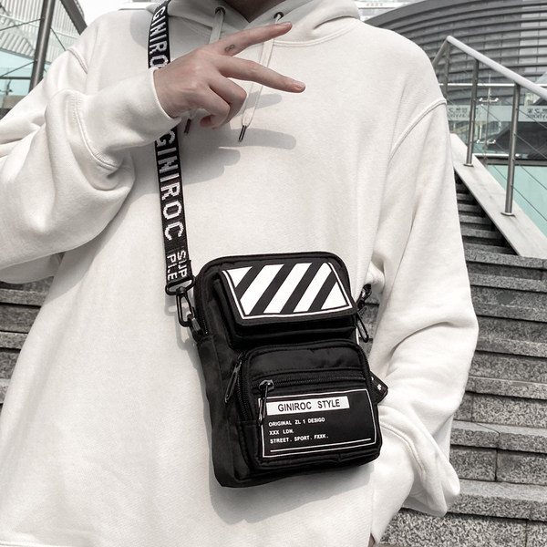 Väike tekstiilist kott pika sangaga