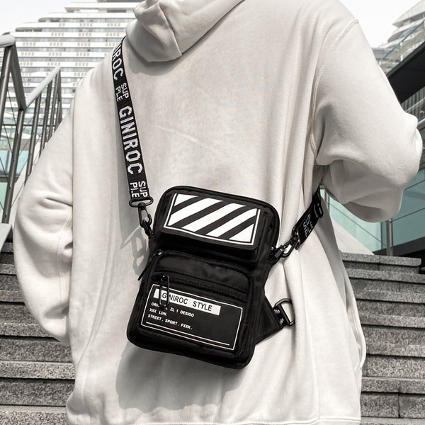 Väike tekstiilist kott pika sangaga