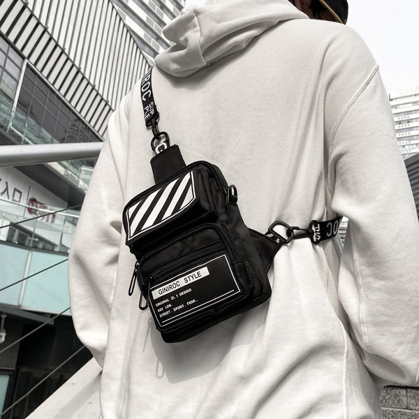 Väike tekstiilist kott pika sangaga