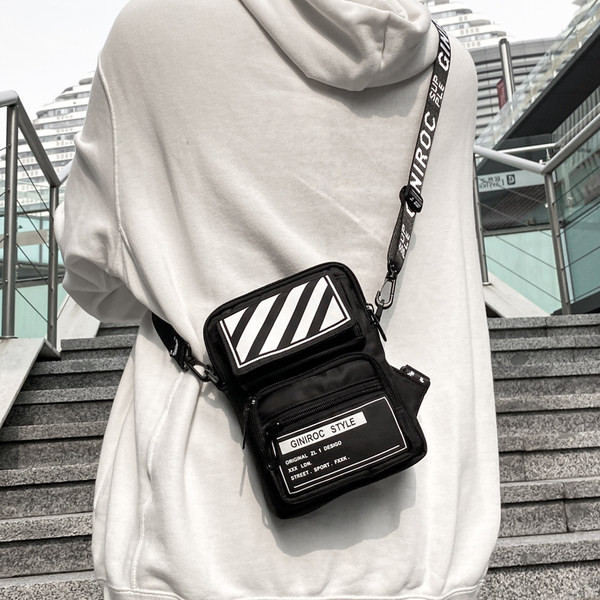 Väike tekstiilist kott pika sangaga