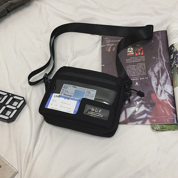 Ανδρική υφασμάτινη τσάντα με ρυθμιζόμενη λαβή και διαφανή τσέπη