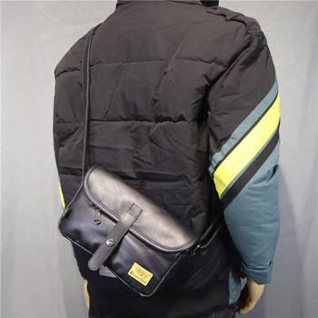 Ανδρική δερμάτινη τσάντα νέου μοντέλου με φερμουάρ και μεταλλικό κούμπωμα