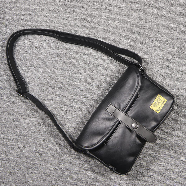 Uue mudeli nahast tõmbluku ja metallkinnitusega meestekott